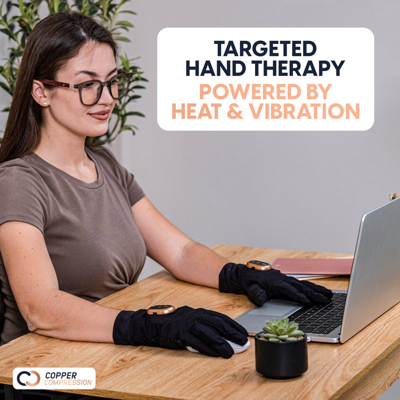Copper Compression CopperVibe 2.0 Gloves, a woman at a desk working on a laptop while wearing the gloves