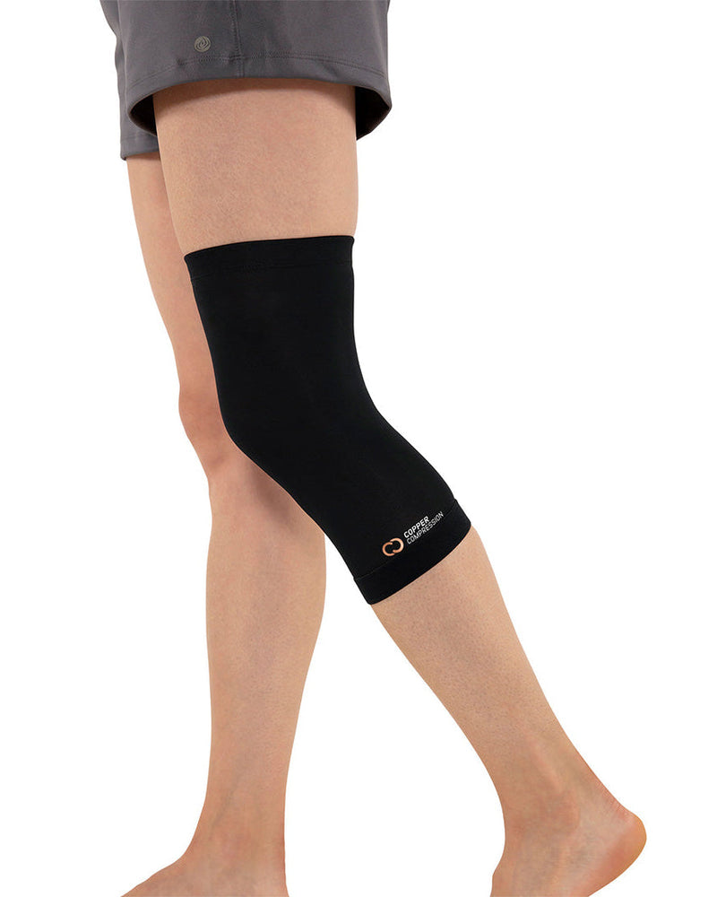 Copper Compression Knee Sleeve, the knee sleeve worn on a leg, seen from the side