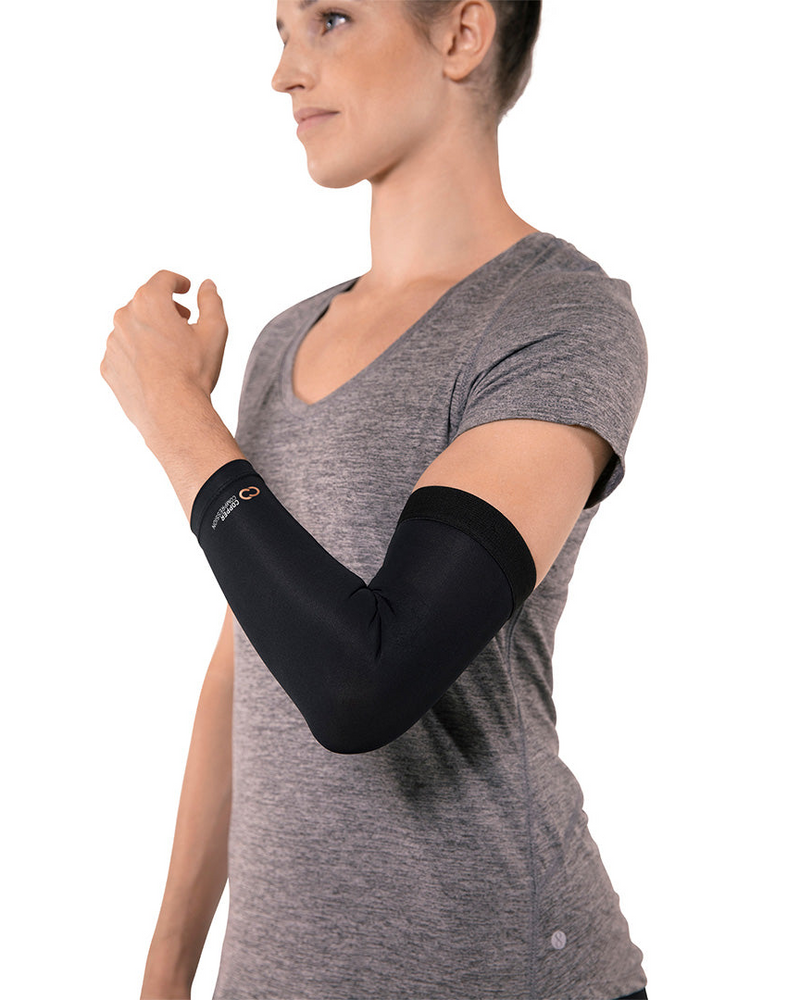 Copper Compression Elbow Sleeve, the elbow sleeve on an arm, close on the joint