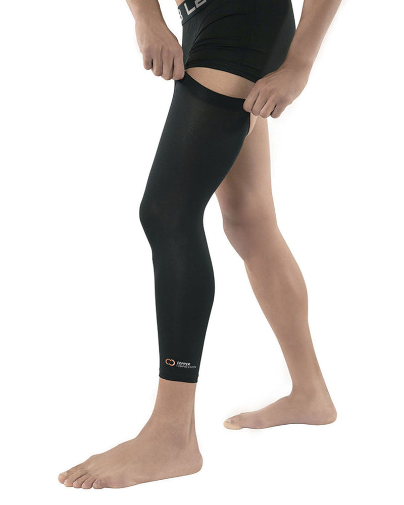 Copper Compression Full Leg Sleeve, the black full leg sleeve on a leg, seen from the side