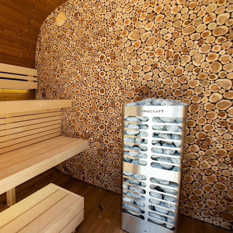 Homecraft Revive sauna heater at the back of a log-walled sauna