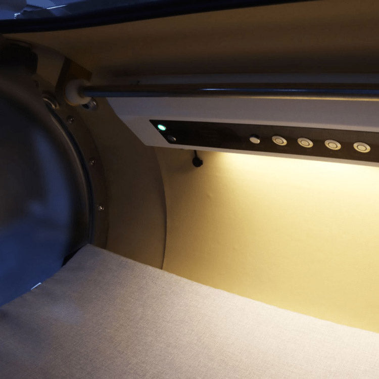 Interior view along the OxyRevo Quest30 cabin showing the LED lighting strip running its length