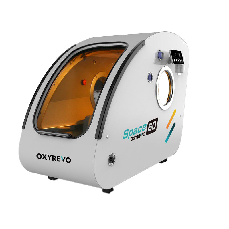 White OxyRevo Space60 hard sitting hyperbaric chamber, an upright pod with an amber-lit interior