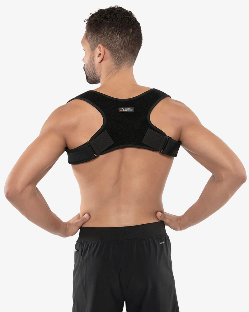 Copper Compression Posture Corrector, the black posture corrector worn over the shoulders, seen from behind