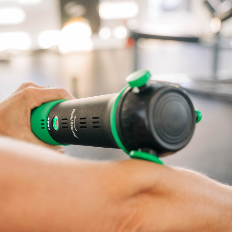 Rapid Release® P3i Vibration Massager in use on a forearm