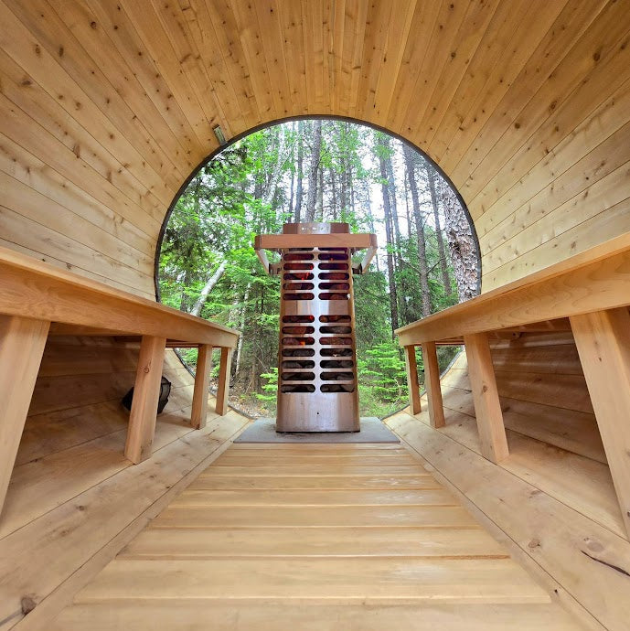 Homecraft Revive sauna heater in a barrel sauna with a round window