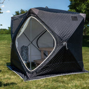 Tent open at the front, bench visible inside, daylight