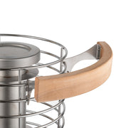 Heater alone on white, empty cage, lower angle
