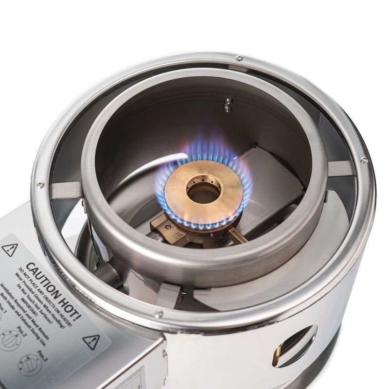 Looking down into the lit burner chamber of the Titan SL1 with a blue flame ring and a CAUTION HOT label