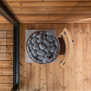 Titan SL1 gas heater on white with the stone basket loaded and no propane tank in frame