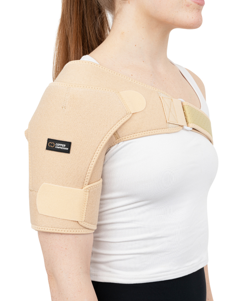 Copper Compression Shoulder Brace, the shoulder brace on a bare shoulder, close on the panel
