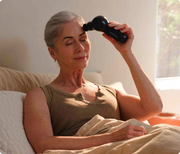 Therabody ThermFace Massage used across the forehead