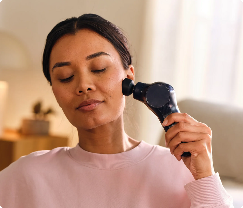 Therabody ThermFace Massage worked along the jaw line