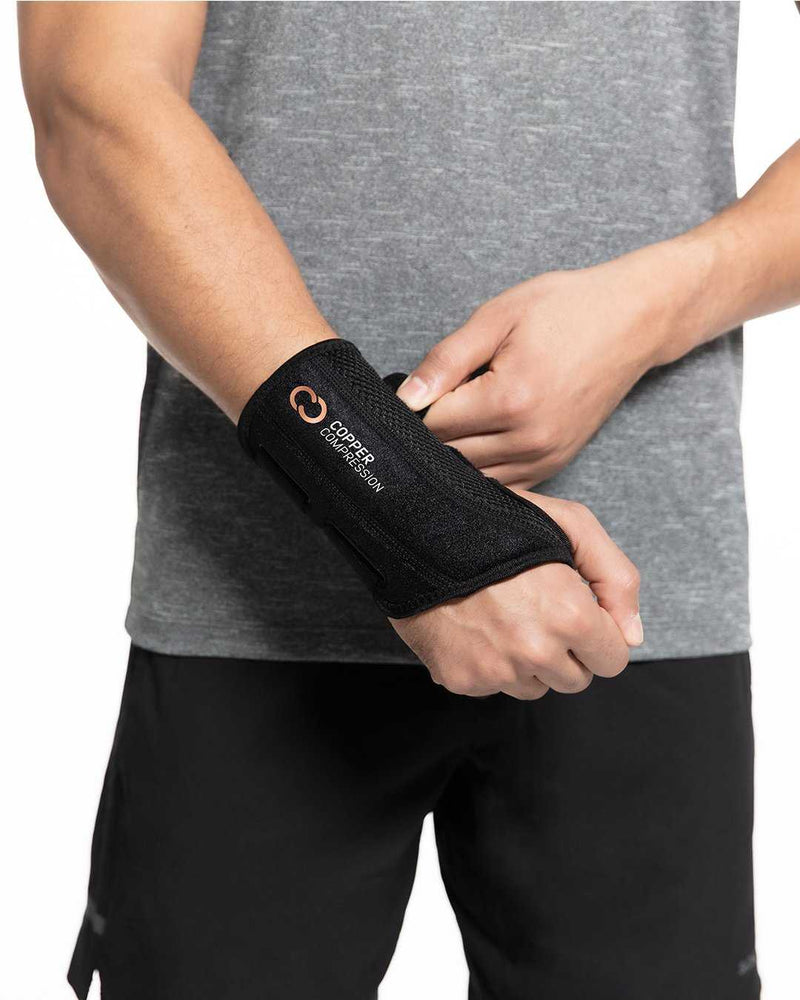 Copper Compression Advanced Wrist Brace, the wrist brace worn on a hand, seen from above