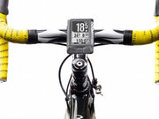 Wahoo ELEMNT Stem Mount, ELEMNT on the stem mount of a bike with yellow bar tape