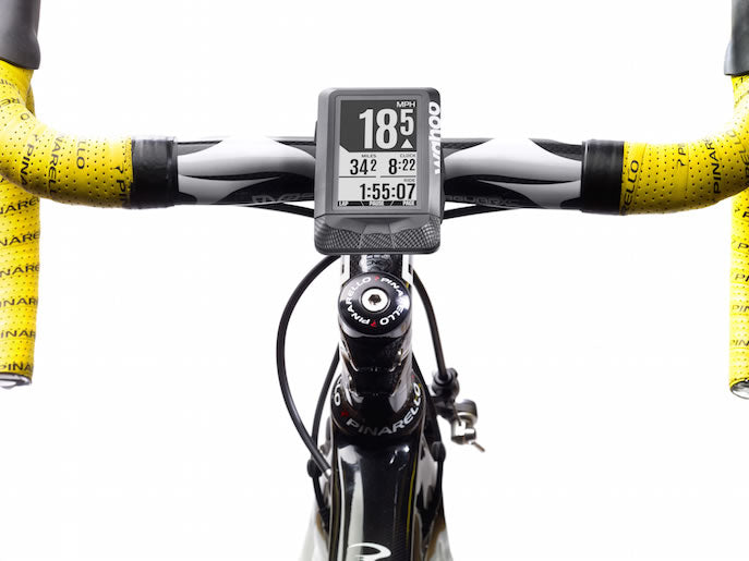 Wahoo ELEMNT Stem Mount, ELEMNT on the stem mount of a bike with yellow bar tape