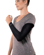 Copper Compression Full Arm Sleeve, the full arm sleeve worn by a woman in a grey tee