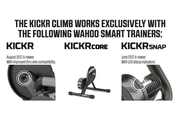 Wahoo KICKR CLIMB, tower under a bike front wheel, dark backdrop