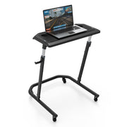 Wahoo KICKR Desk, desk at standing height with a laptop