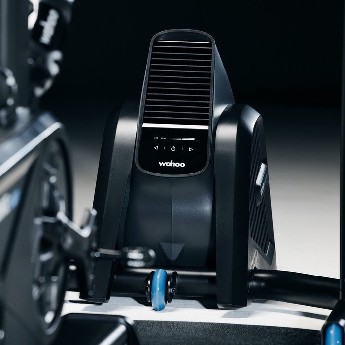 Wahoo KICKR Headwind, fan in front of a bike and trainer, dark room