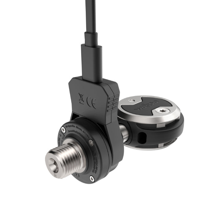 Wahoo SPEEDPLAY POWER Charging Kit, charging cable clipped to the pod of a pedal