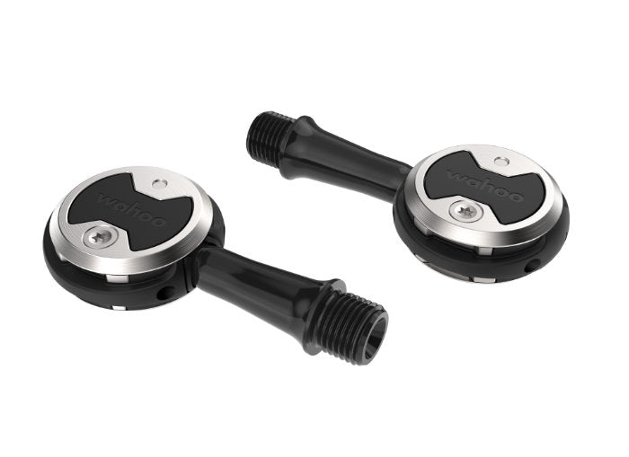 Wahoo SPEEDPLAY COMP, pair of all-black pedals, one flat and one on its side