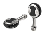 Wahoo SPEEDPLAY ZERO, two pedals, one flat and one standing on its spindle end