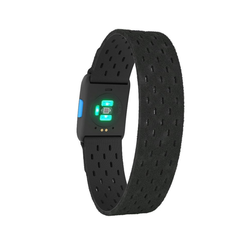 Wahoo TICKR FIT, armband standing upright with green LEDs lit