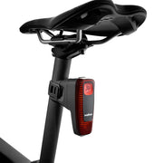 Wahoo TRACKR RADAR Tail Light, light on a black seatpost under the saddle, unlit