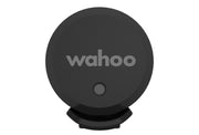Wahoo TRACKR SPEED Sensor, round black sensor face with Wahoo logo and small LED